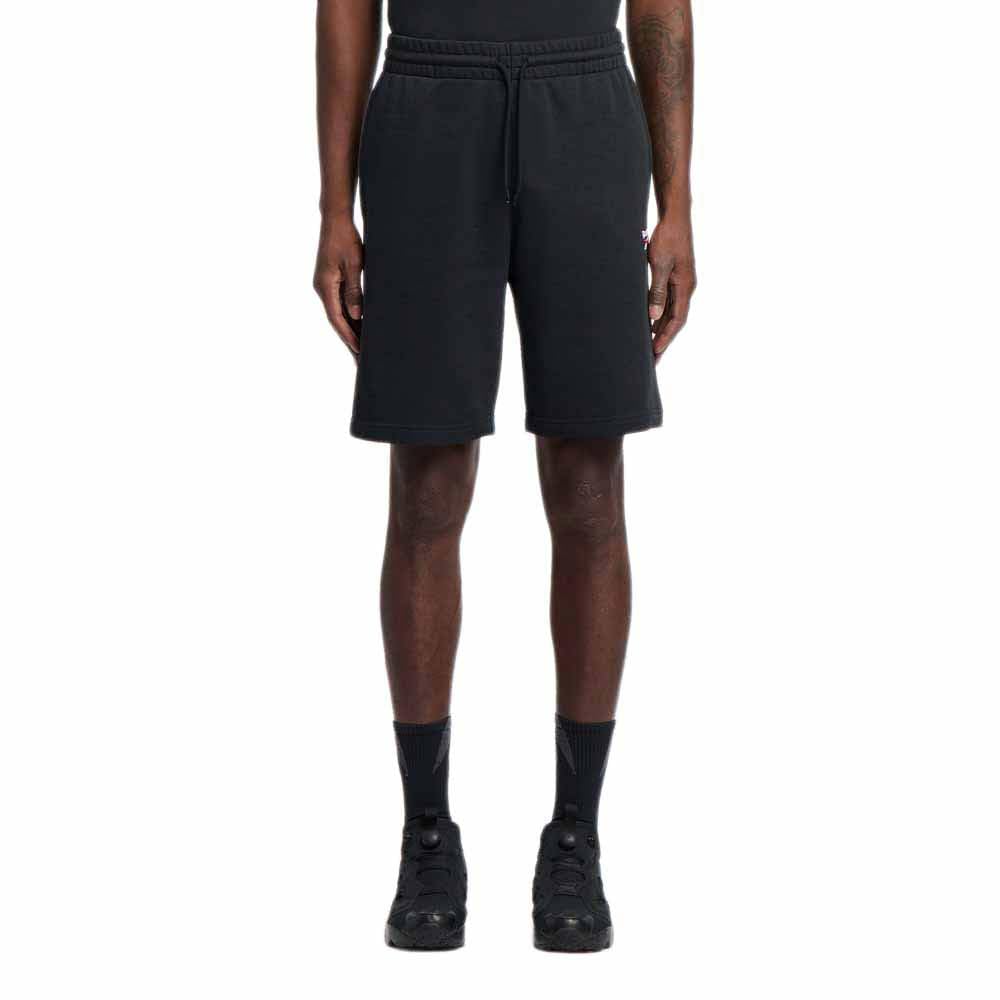 41UrHKE-QaL ريبوك شورت ايدينتيتي بشعار صغير للرجال