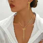 21vyNqvECoL._AC_SL1500_ طقم عقد واقراط ذهبية على شكل فيونكة متدلية بشراشيب متدلية، مجوهرات انيقة للازياء والاكسسوارات، هدية للنساء والكبار - الصورة 2